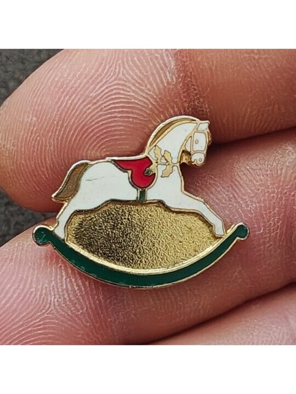 1989 Hallmark Rocking Horse Gold Tone With White, Red & Green Enamel Pin